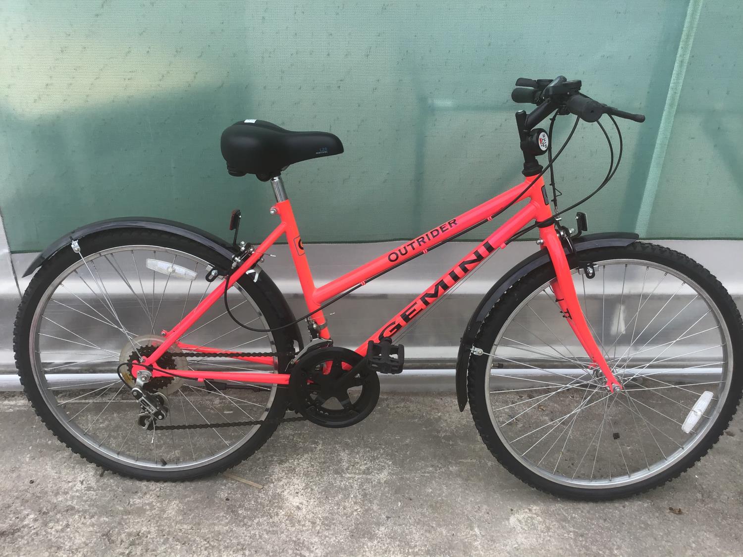 AN OUTRIDER GEMINI LADIES BIKE WITH A TEN GEAR SHIMANO SYSTEM