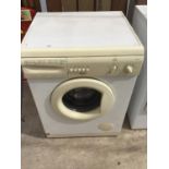 A WHIRLPOOL AWM1403 WASHING MACHINE IN WORKING ORDER