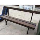 A WOODEN BENCH WITH CAST IRON BENCH ENDS DETAILED WITH 'UNITY WOOD & IRON CO PADIHAM' 157CM LONG