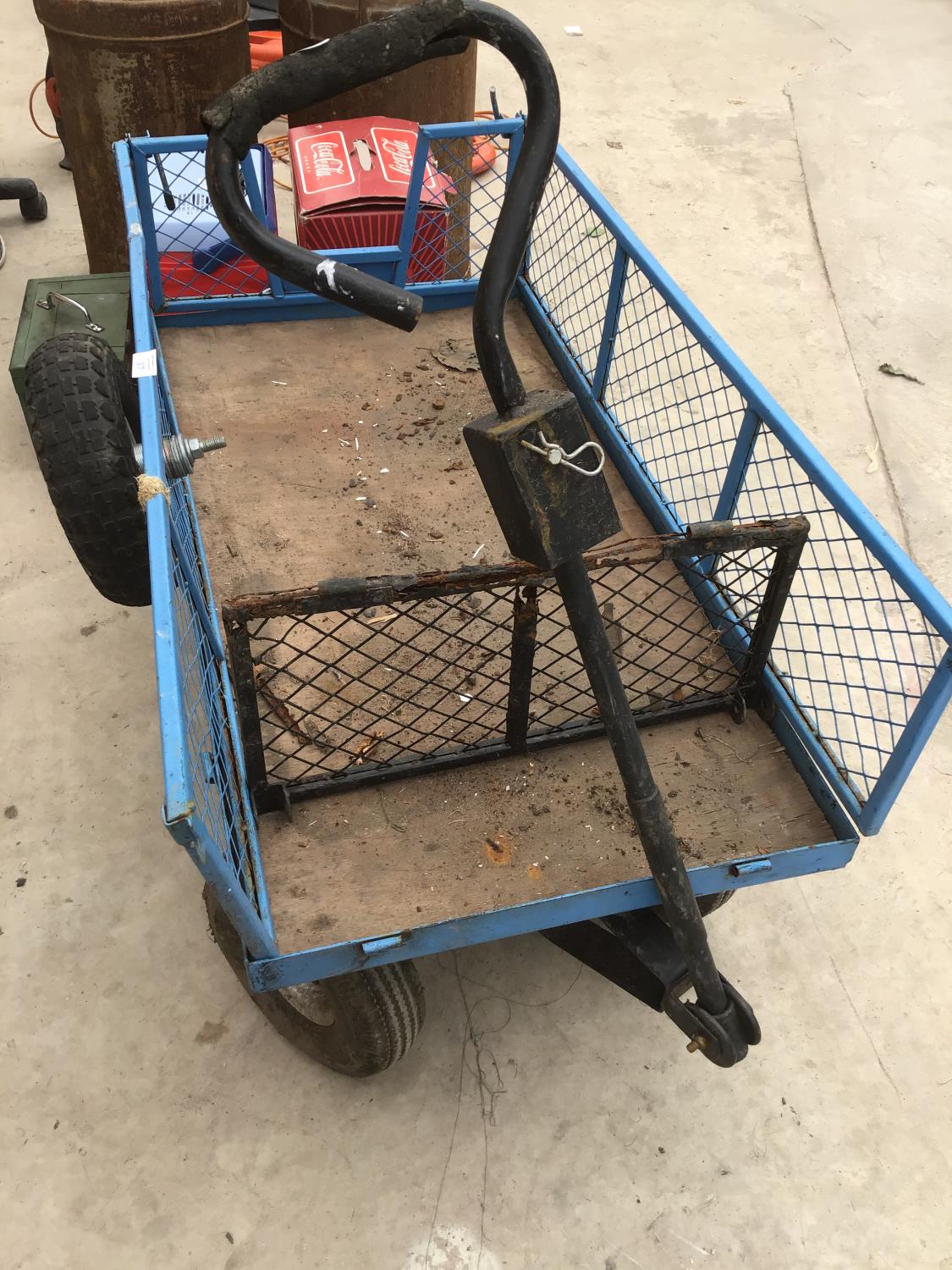 A MESH SIDED FOUR WHEEL TROLLEY WITH TYRE WHEELS AND A SPARE TYRE - Image 2 of 2