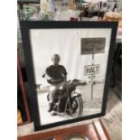 A LARGE FRAMED STEVE MCQUEEN 'GREAT ESCAPE' PICTURE