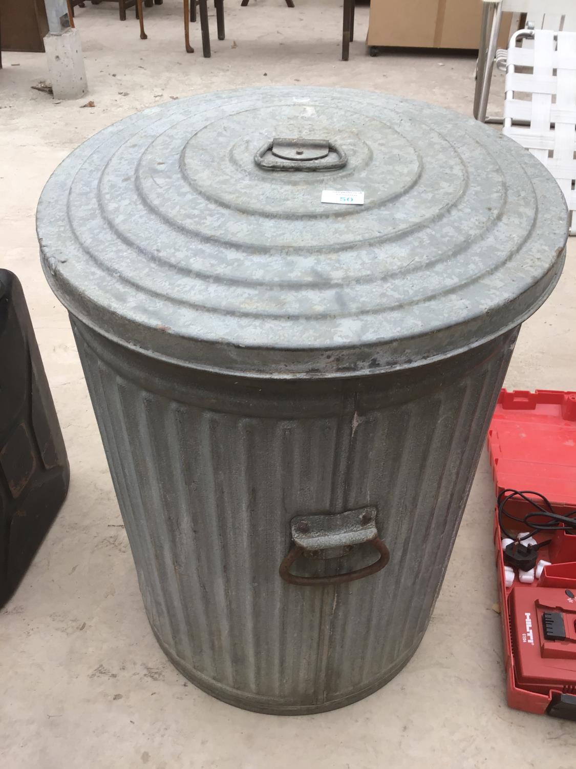 A VINTAGE GALVANISED BIN WITH LID