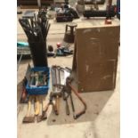 VARIOUS TOOLS TO INCLUDE AXES, SAWS, SHEARS, A PASTING TABLE AND A SET OF DRAINING RODS