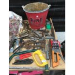 A VINTAGE FIRE BUCKET AND A COLLECTION OF TOOLS