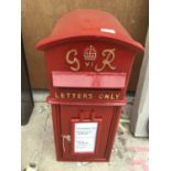 A RED G & R VICTORIAN STYLE POST BOX WITH KEYS