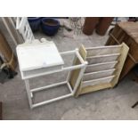 A WHITE HALL STAND AND A CANVAS RACK