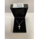 A BOXED SILVER CROSS NECKLACE