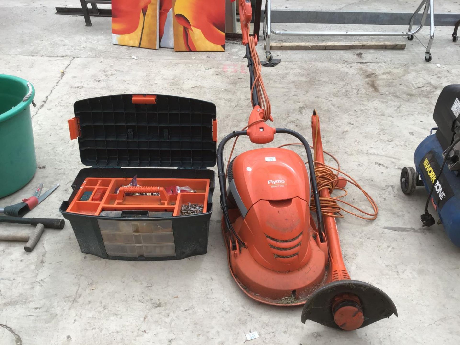 A FLYMO MULTI TRIM AUTO +, A FLYMO MOW N VAC, AND A TOOL BOX IN WORKING ORDER