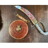 A VINTAGE LEATHER TAPE MEASURE AND COLLECTABLE KNIFE