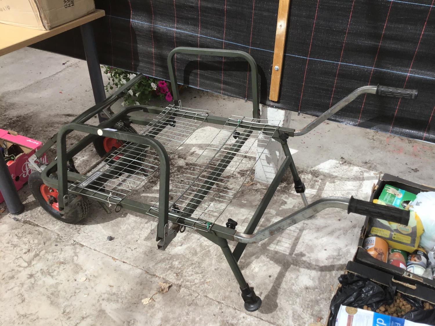 A FOLDING FISHING TROLLEY WITH REMOVABLE WHEELS