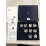 NINE CASED SILVER PROOF £5 COINS