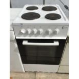 A FLAVEL COOKER WITH OVEN AND GRILL AND HOB