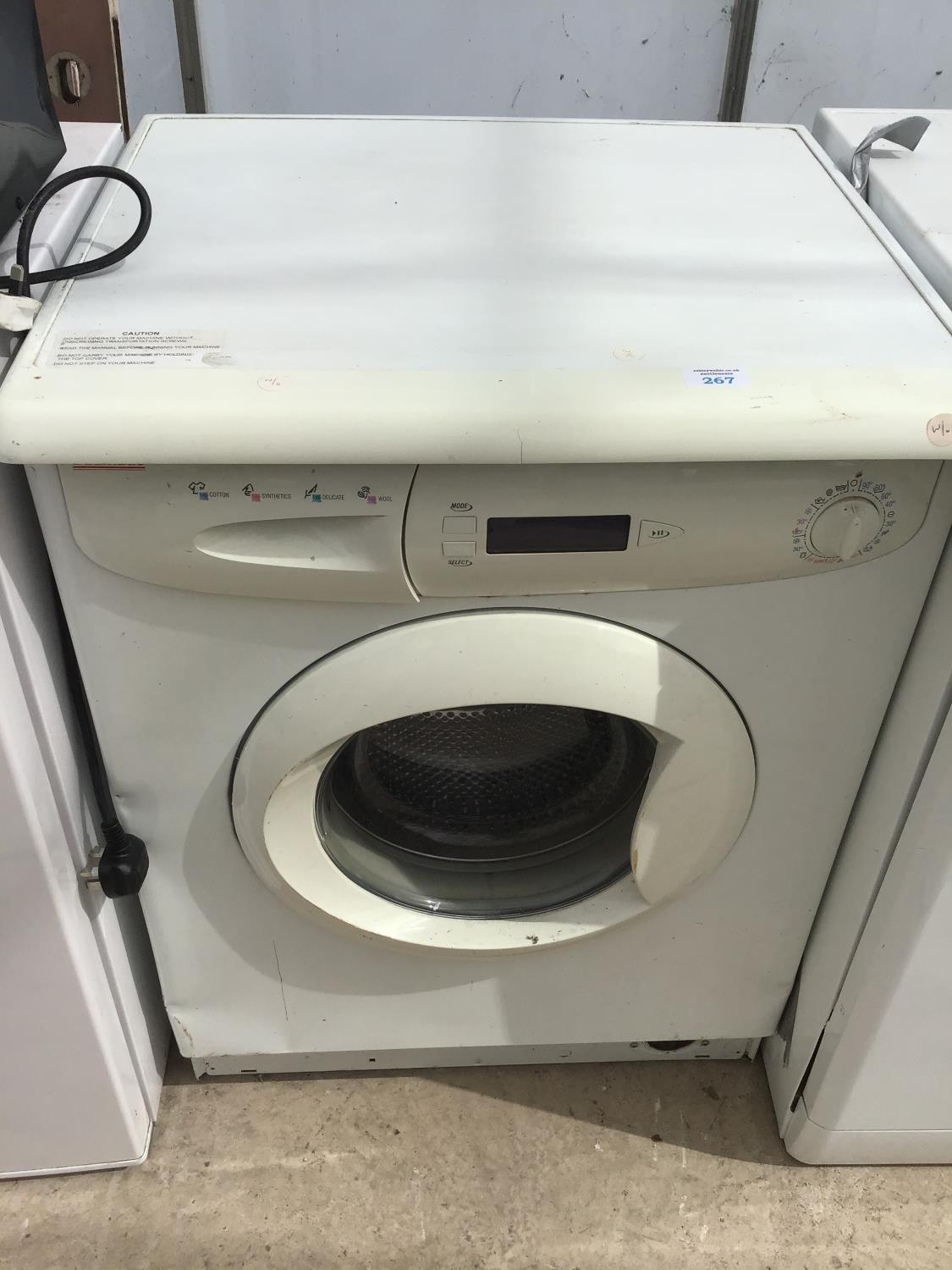 A BAUMATIC WASHING MACHINE IN WORKING ORDER (TOP LOOSE)