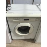 A BAUMATIC WASHING MACHINE IN WORKING ORDER (TOP LOOSE)