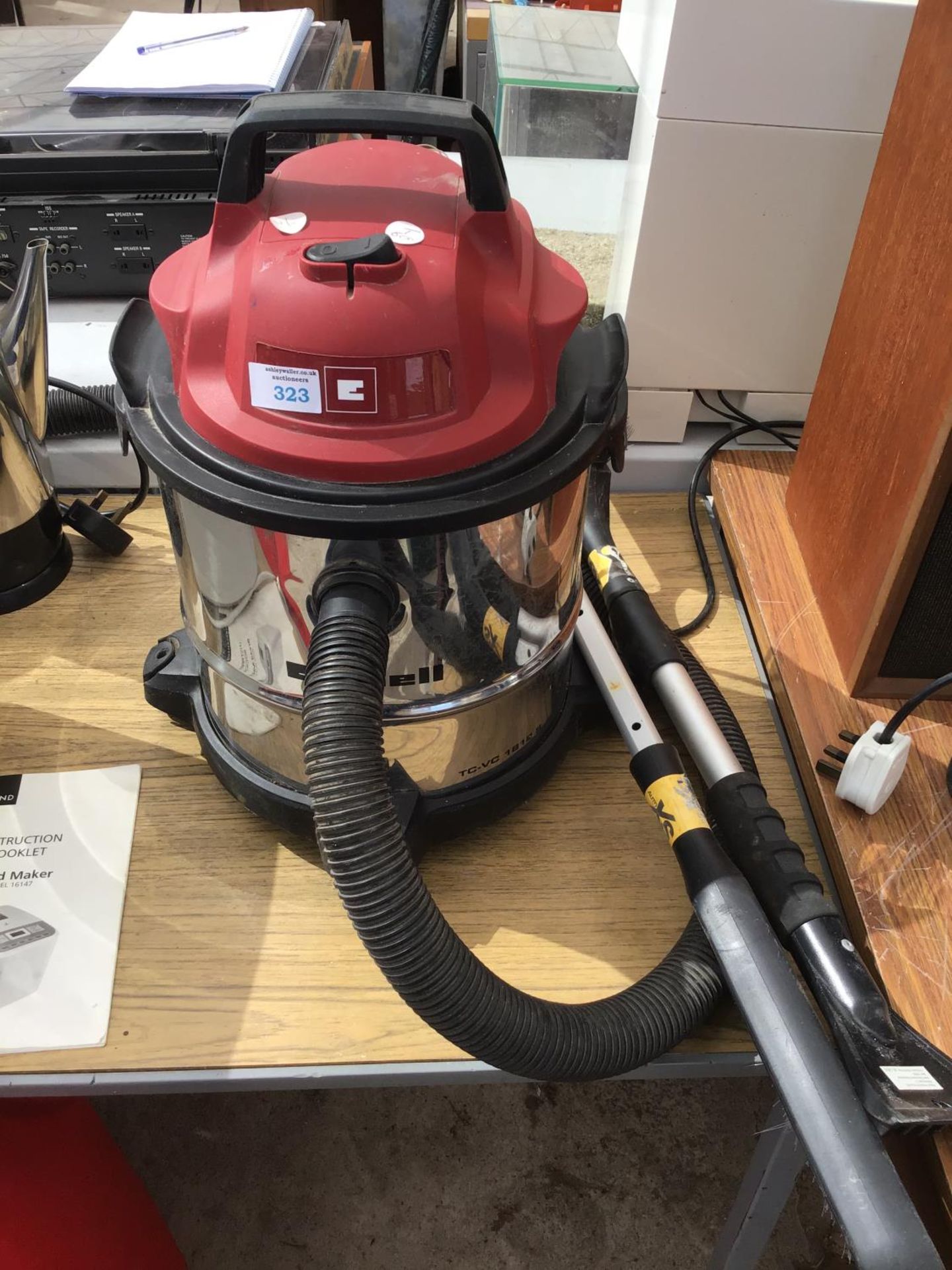 AN EINHELL WET AND DRY VAC IN WORKING ORDER WITH TWO BRUSH AND SCRAPERS