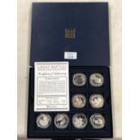 EIGHT CASED SILVER PROOF £5 COINS