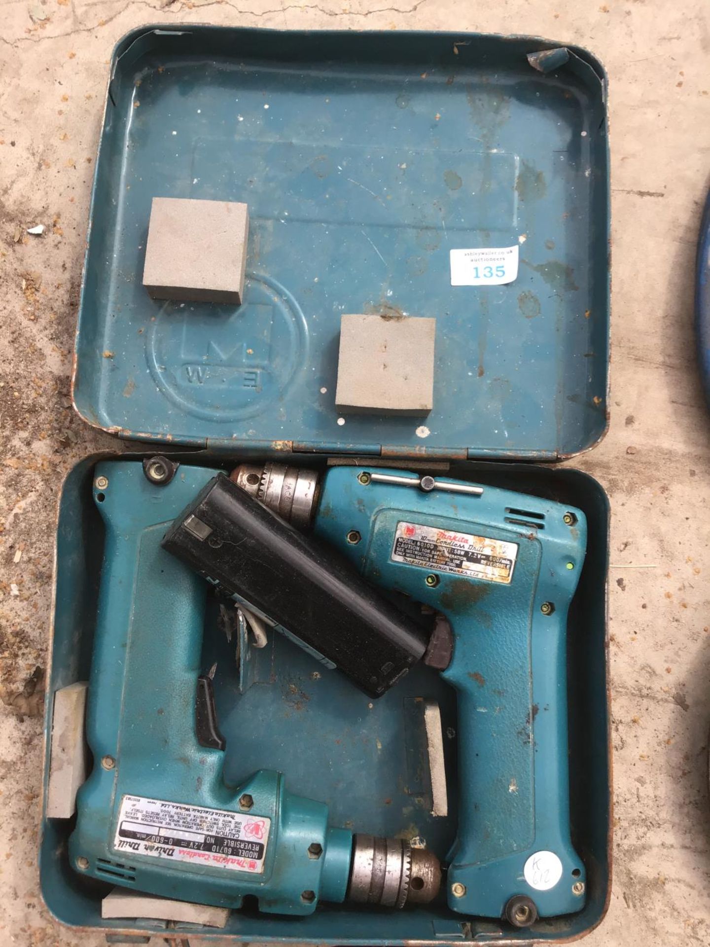 TWO MAKITA DRILLS IN A CASE WITH A SPARE BATTERY