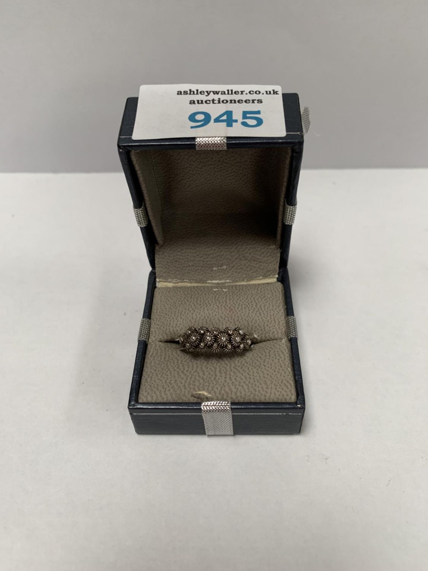 A BOXED SILVER LADIES RING