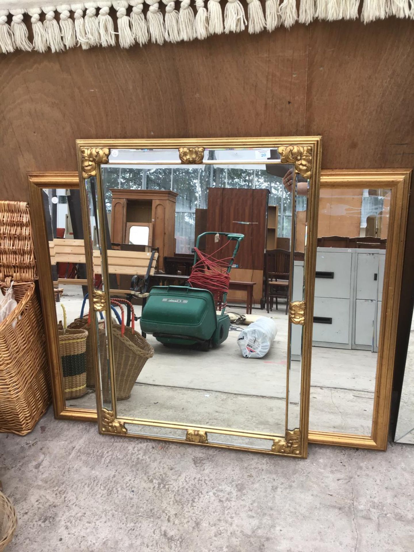 ONE GILT FRAMED MIRROR AND A FURTHER ORNATE MIRROR