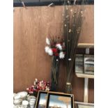 A DECORATIVE DISPLAY AND FLOWERS