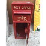 A RED POST OFFICE POST BOX WITH KEYS