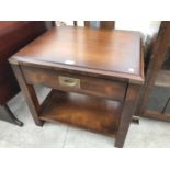 A MAHOGANY OCCASIONAL TABLE WITH RECESSED BRASS HANDLE