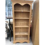 A PINE TALL BOOKSHELF UNIT