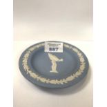 A WEDGEWOOD JASPER WARE FLING LAD ASHTRAY