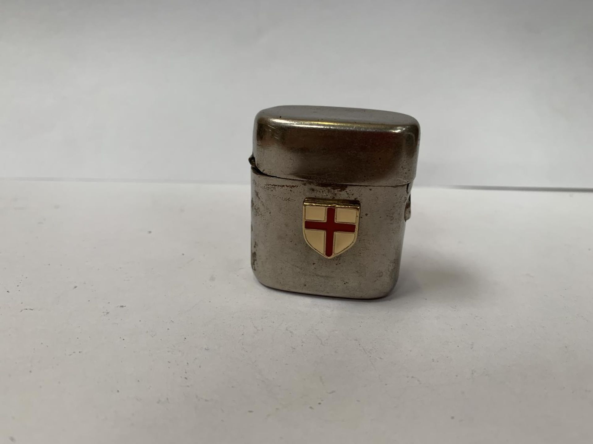 A VINTAGE SILVER LIGHTER