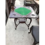 A QUARTERED MAHOGANY FOLDING CARD TABLE WITH SINGLE DRAWER