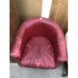 A RED LEATHER TUB CHAIR