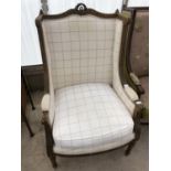 A FRENCH STYLE DECORATIVE ARMCHAIR WITH CHEQUED UPHOLSTERY