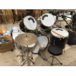 A PERFORMANCE PERCUSSION FIVE DRUM KIT WITH CYMBAL, STICKS AND STOOL