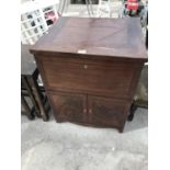 A MAHOGANY WASHSTAND CABINET WITH HINGED TOP AND SINGLE DOOR