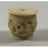 A 19TH CENTURY CARVED IVORY LIDDED POT, HEIGHT 2CM