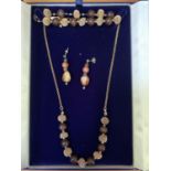 A LADIES NECKLACE AND EARRINGS SET