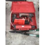 A HILTI MD2000 RESIN GUN APPLICATOR WITH CARRY CASE AND A PAIR OF GARDEN SHEARS