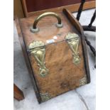 A MAHOGANY AND BRASS BOUND COAL BUCKET