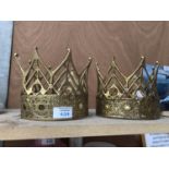 A PAIR OF DECORATIVE GOLD COLOURED CROWNS