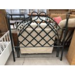 A GREEN METAL HEADBOARD