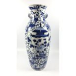 A 19TH CENTURY CHINESE KANGXI STYLE BLUE AND WHITE VASE WITH FIGURES HOLDING A VASE DESIGN, FOUR
