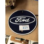 A SMALL CAST FORD SIGN