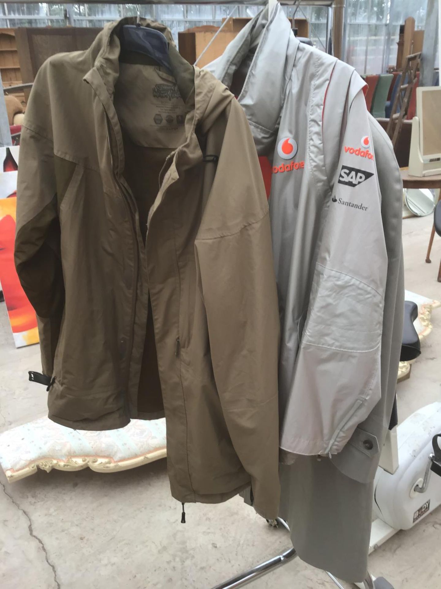 THREE XL COATS TO INCLUDE A MCLAREN VODAFONE MERCEDES JACKET, A WIERD FISH AND A DANNIMAC RAINCOAT