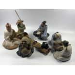 A GROUP OF FIVE VINTAGE STONEWARE CHINESE POTTERY FIGURES, HEIGHT OF LARGEST INCLUDING ROD 21.5CM