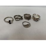 A COLLECTION OF FIVE SILVER RINGS
