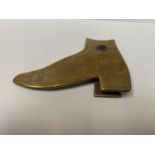 A BRASS TRENCH ART SHOE CLIP