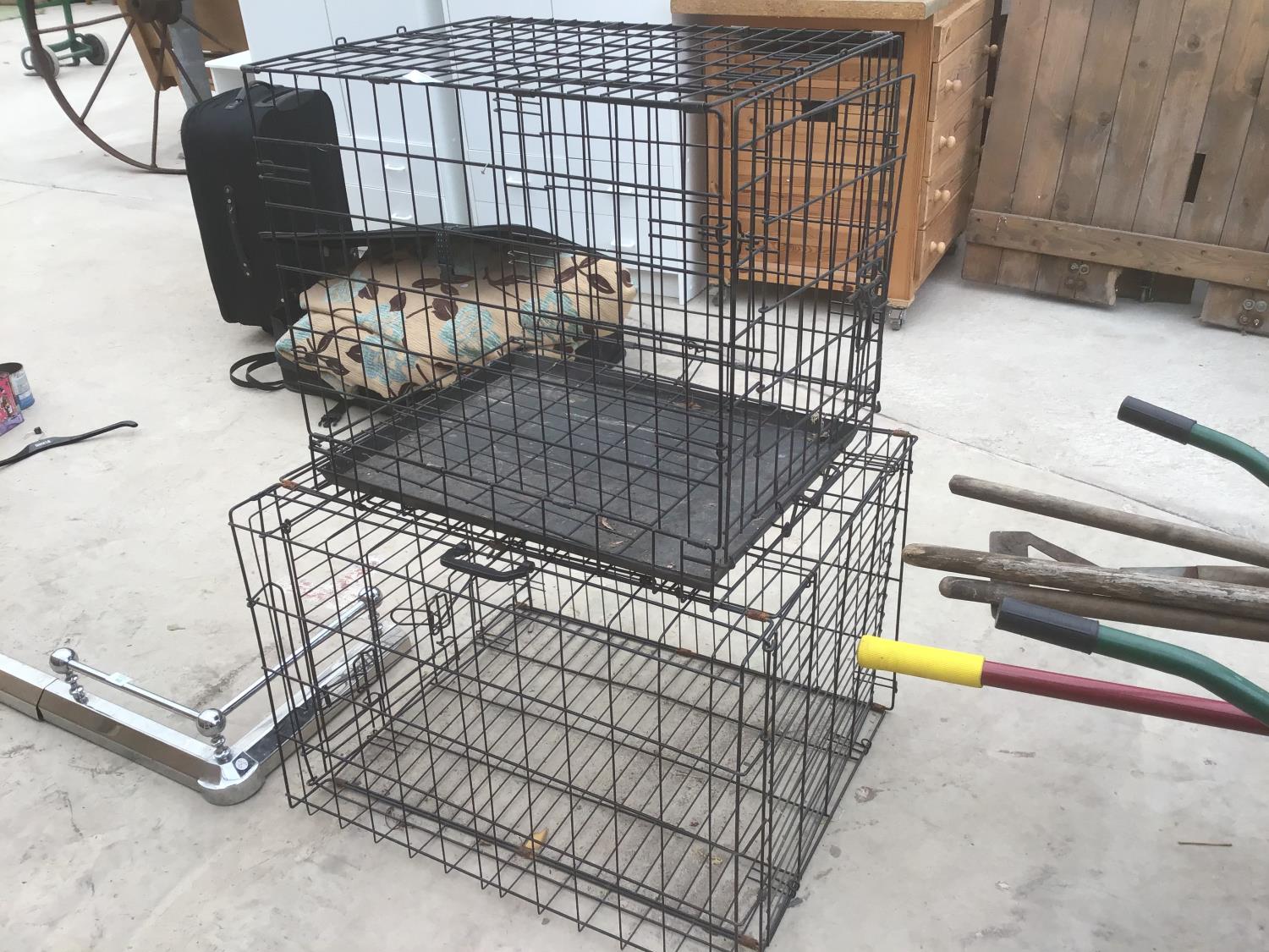 TWO PET CAGES 61CM X 46CM X 54CM WITH TRAY AND 75CM X 60CM X 53CM