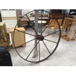 A LARGE METAL VINTAGE WHEEL- PARMITERS TISBURY