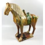 A TANG DYNASTY STYLE SANCAI GLAZE HORSE MODEL, UNMARKED TO BASE, HEIGHT 20CM