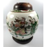 A 19TH CENTURY CHINESE FAMILLE VERTE GINGER JAR WITH WOODEN LID AND STAND, FOUR CHARACTER MARK TO